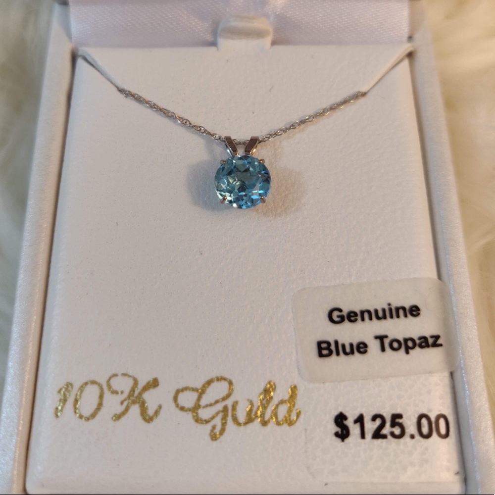 Solid 10k white gold necklace gen. blue topaz
